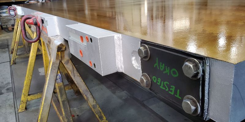 Final coat of paint on refurbished platens.