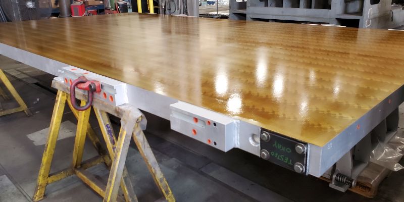 Final coat of paint on refurbished platens.